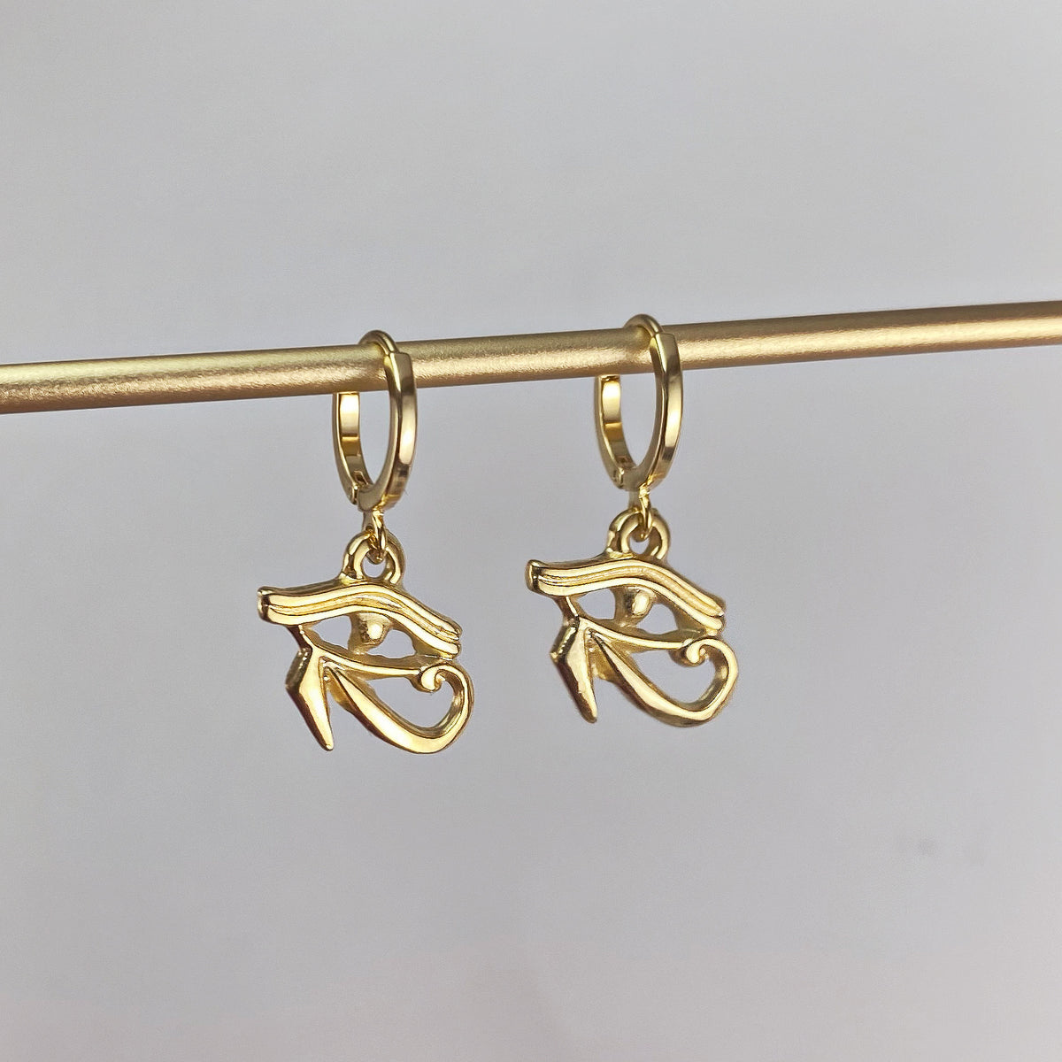 EYE OF HORUS | HUGGIE HOOP EARRINGS – Mystic Rebel Shop